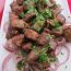 Liver on a bed of red onions